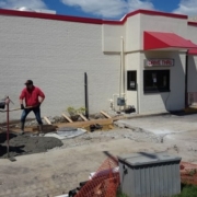 The Plumbing Pro team laying concrete over Grease trap replacement at Arbys in Mission KS