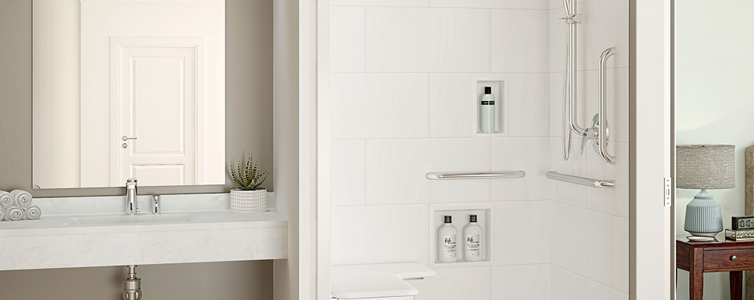 Minimalist bathroom with wall-mounted fixtures and a large mirror.