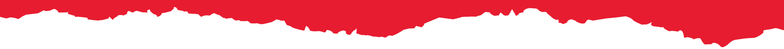 Red paint splash forming an abstract shape on white background.