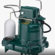 Close-up of a Zoeller sump pump, showcasing its robust, cast-iron construction. The pump features a green finish with a sturdy base and a vertical float switch for automatic operation. Various connectors and the Zoeller logo are visible, emphasizing the brand's quality and durability in water removal solutions.