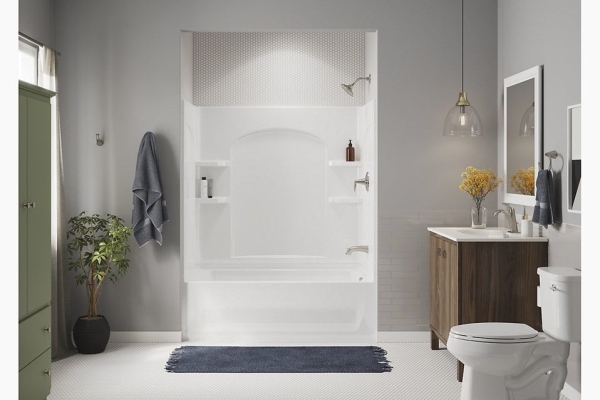 Modern bathroom with a freestanding bathtub and elegant fixtures.